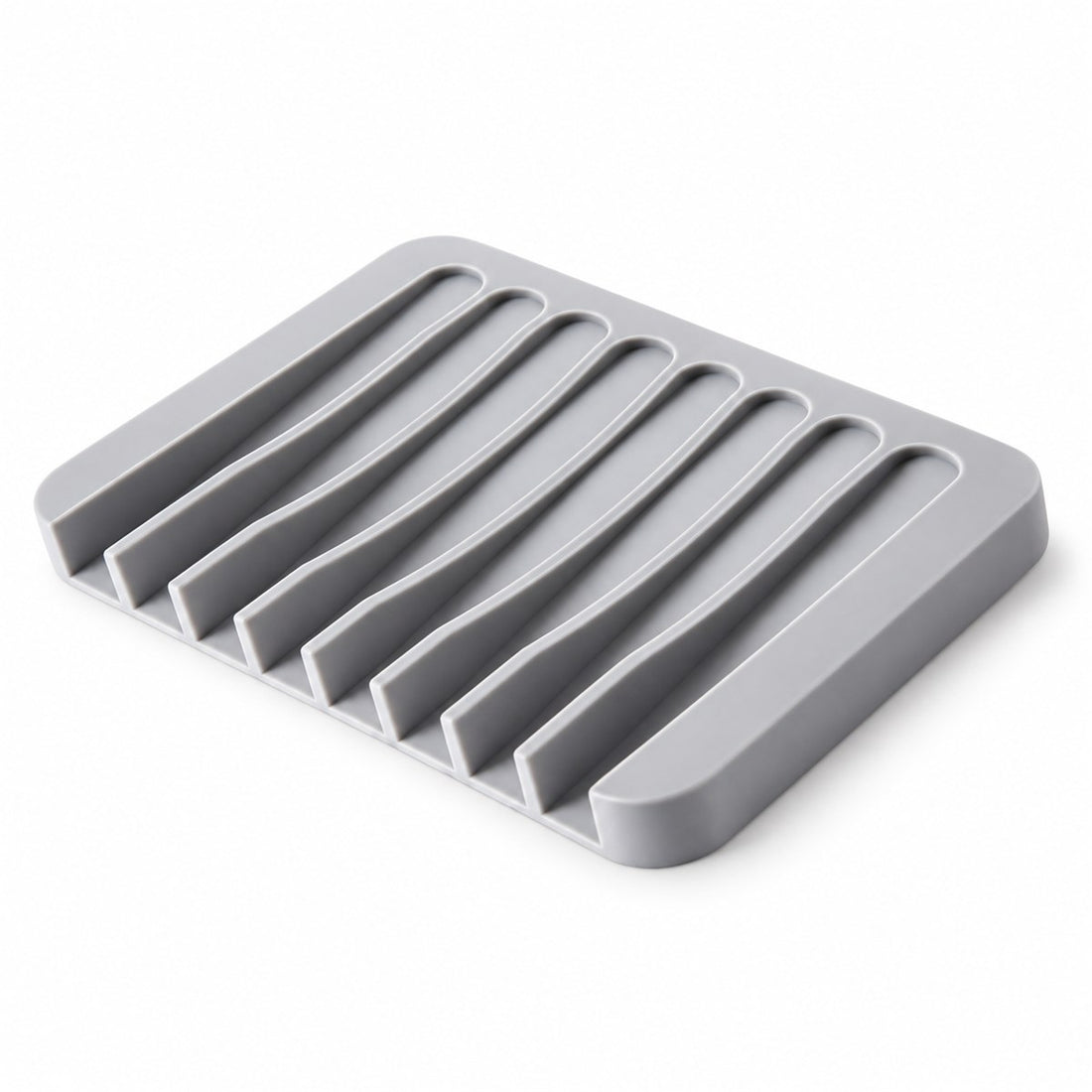 Saboneteira de silicone autodrenante com base antiderrapante para a pia, vista frontal em fundo branco