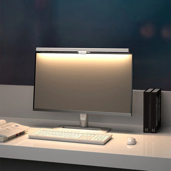 Barra de luz para monitor preta acesa na borda superior de uma tela