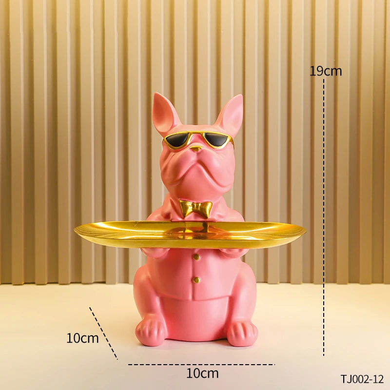 Escultura decorativa de cachorro com bandeja guardando chave e óculos
