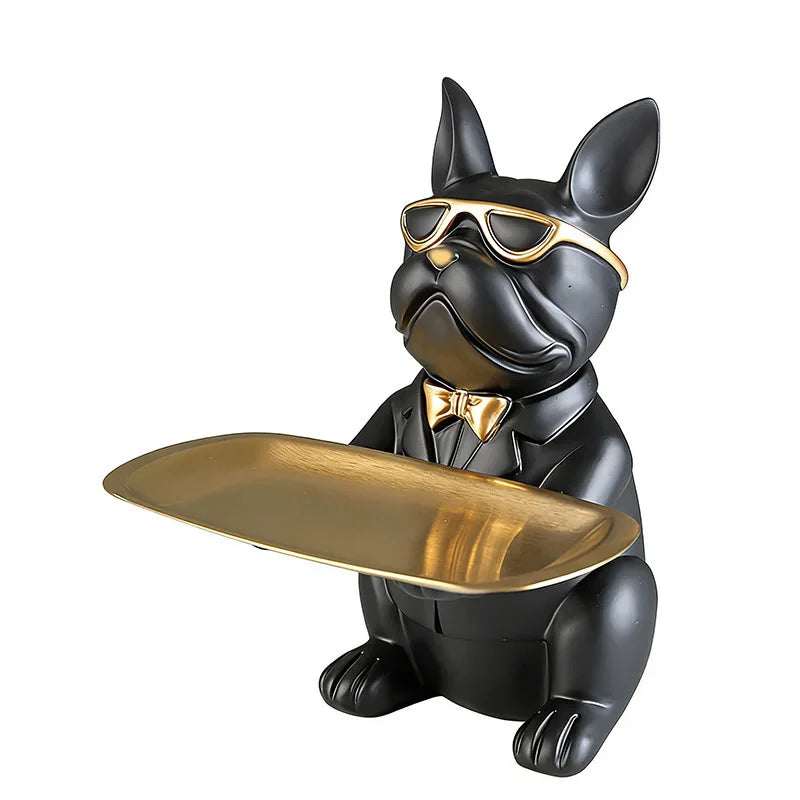 Enfeite decorativo de cachorro com bandeja sobre a mesa de escritório